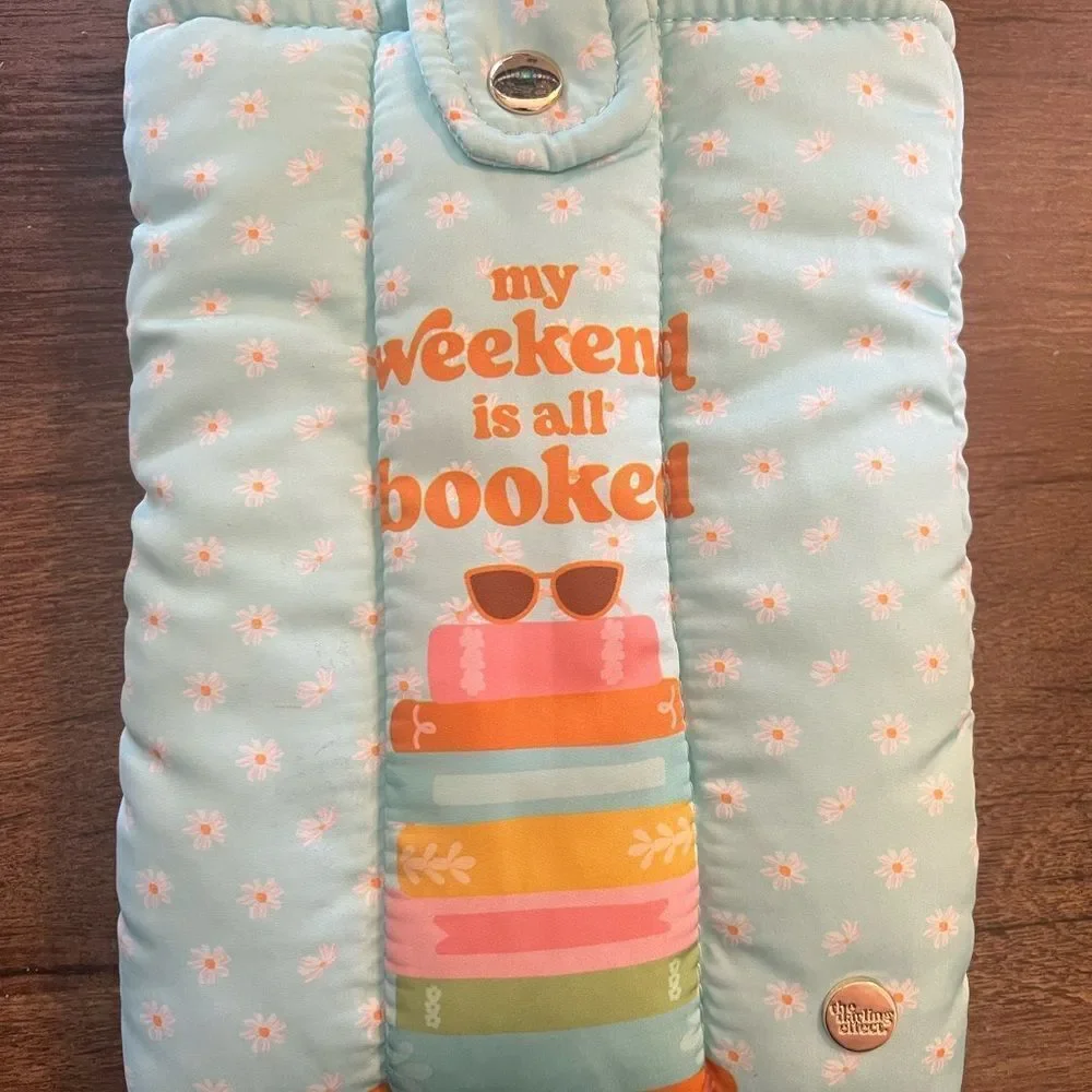 Light Blue Quilted Book Sleeve with Orange Text